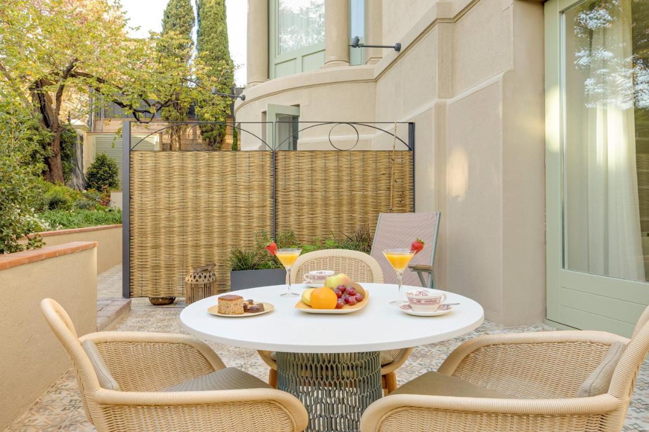 Hotel Boutique Mirlo 巴塞罗那 外观 照片 A typical patio
