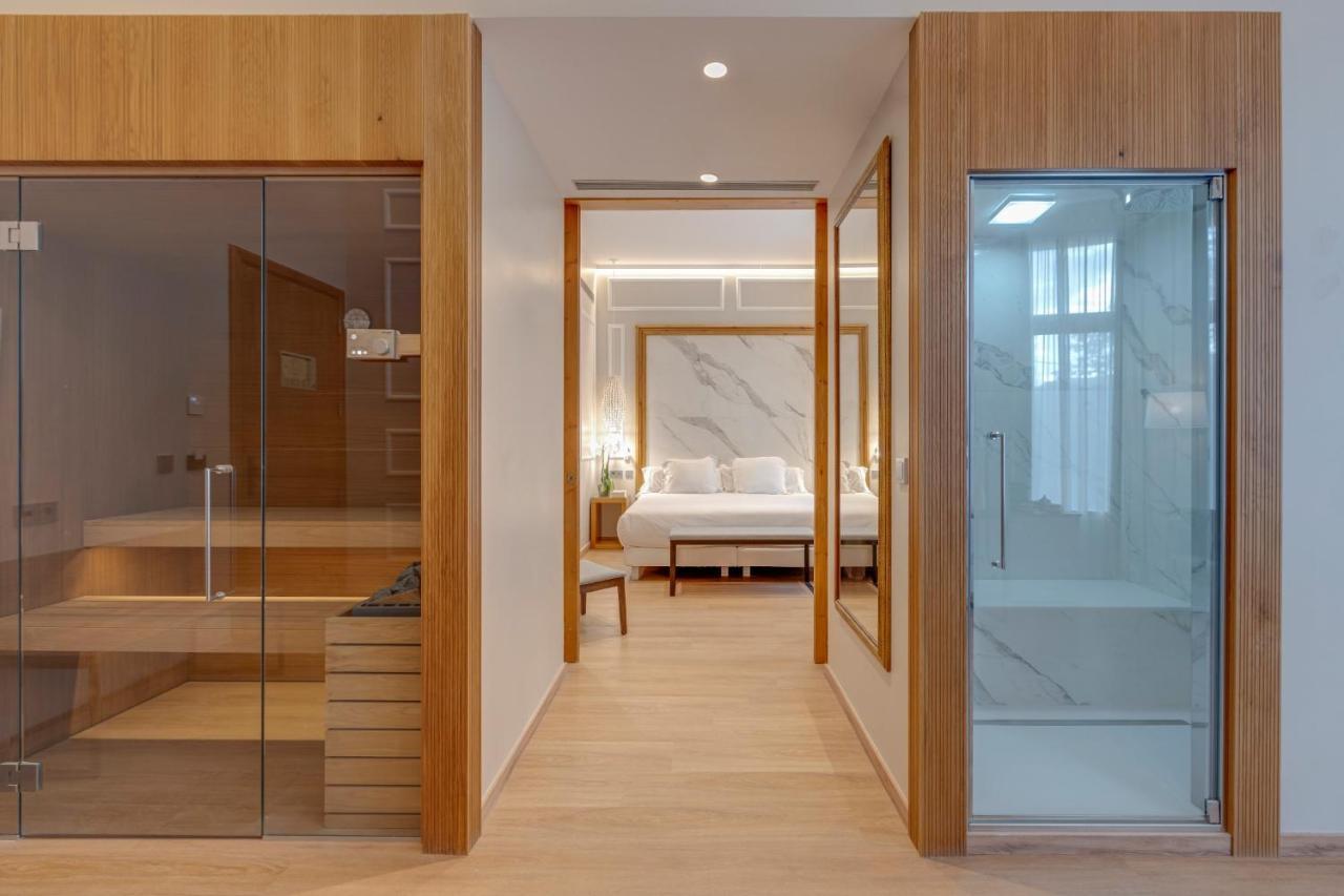 Hotel Boutique Mirlo 巴塞罗那 外观 照片 A suite at the hotel